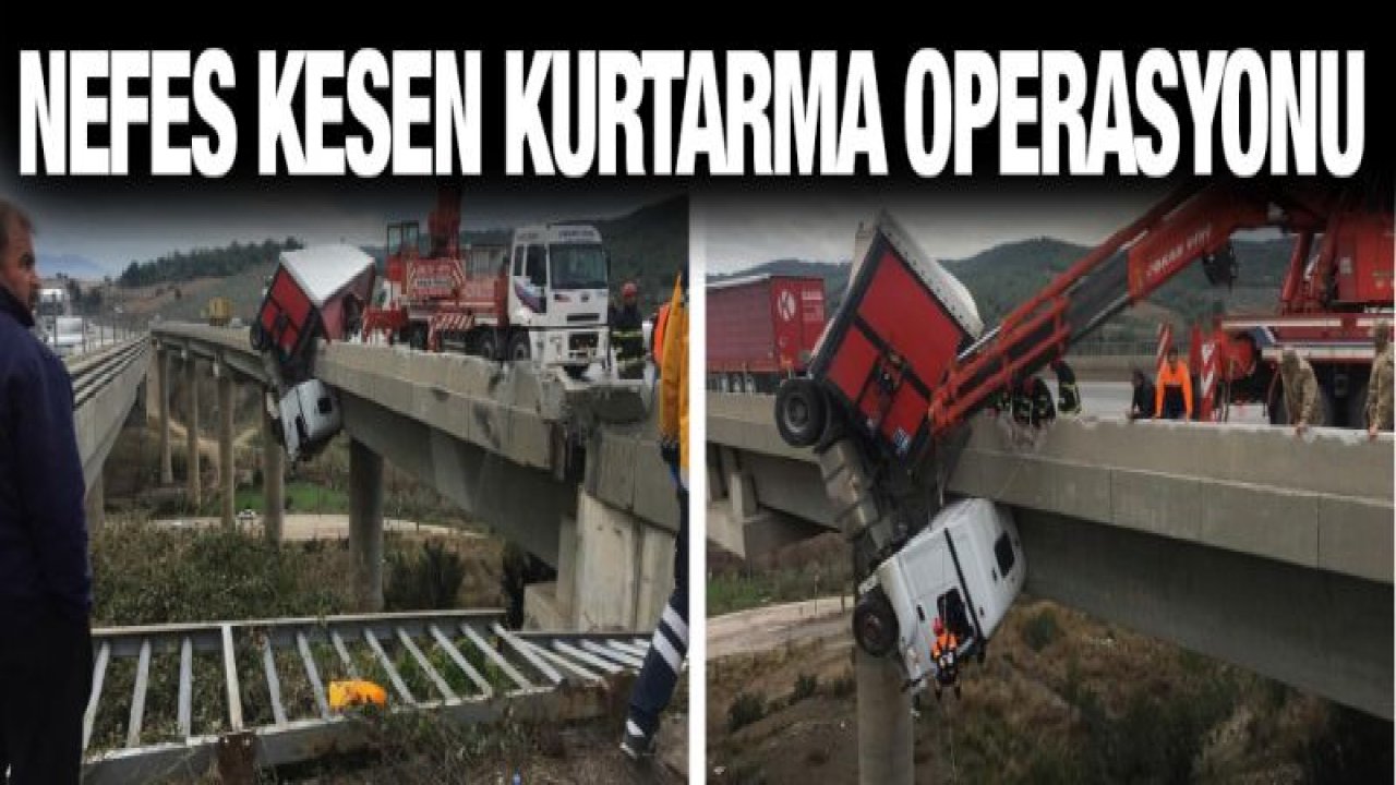 Viyadükte asılı kalan tır şoförü kıl payı kurtarıldı