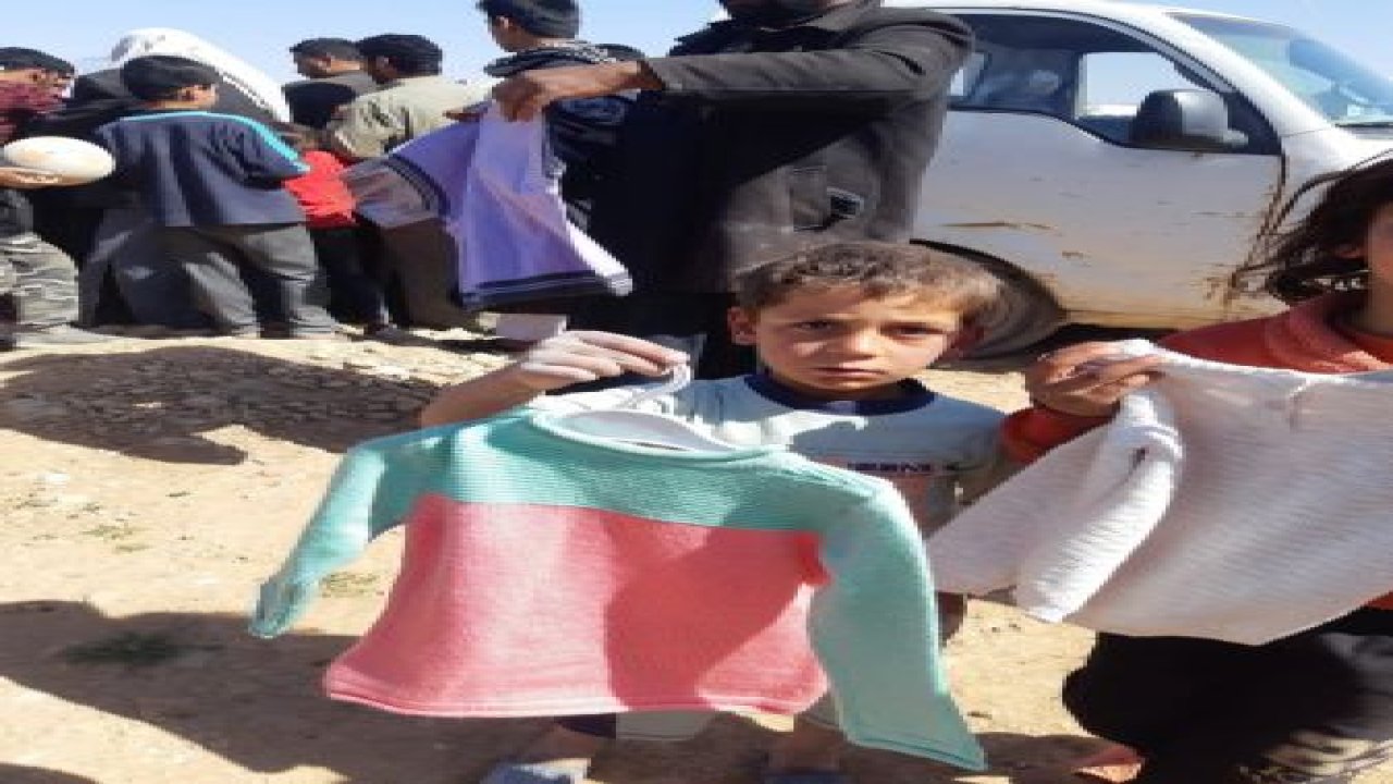 İmkander’den kampta kalan çocuklara giyim yardımı