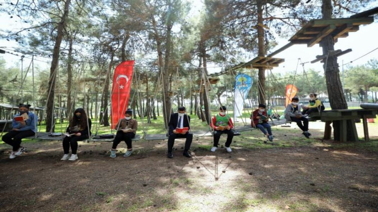 Başkan Fadıloğlu, anne ve çocuklarla doğada kitap okudu