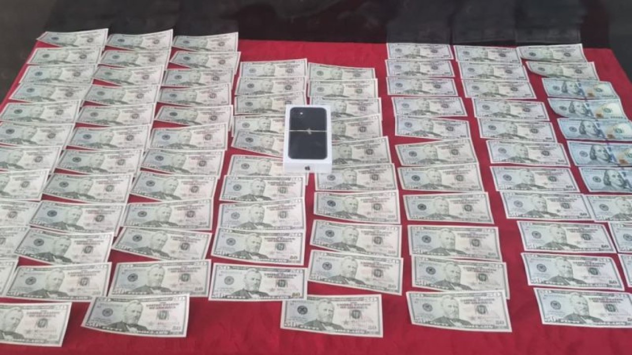 Sahte dolar ile cep telefonu alan şahıs yakalandı