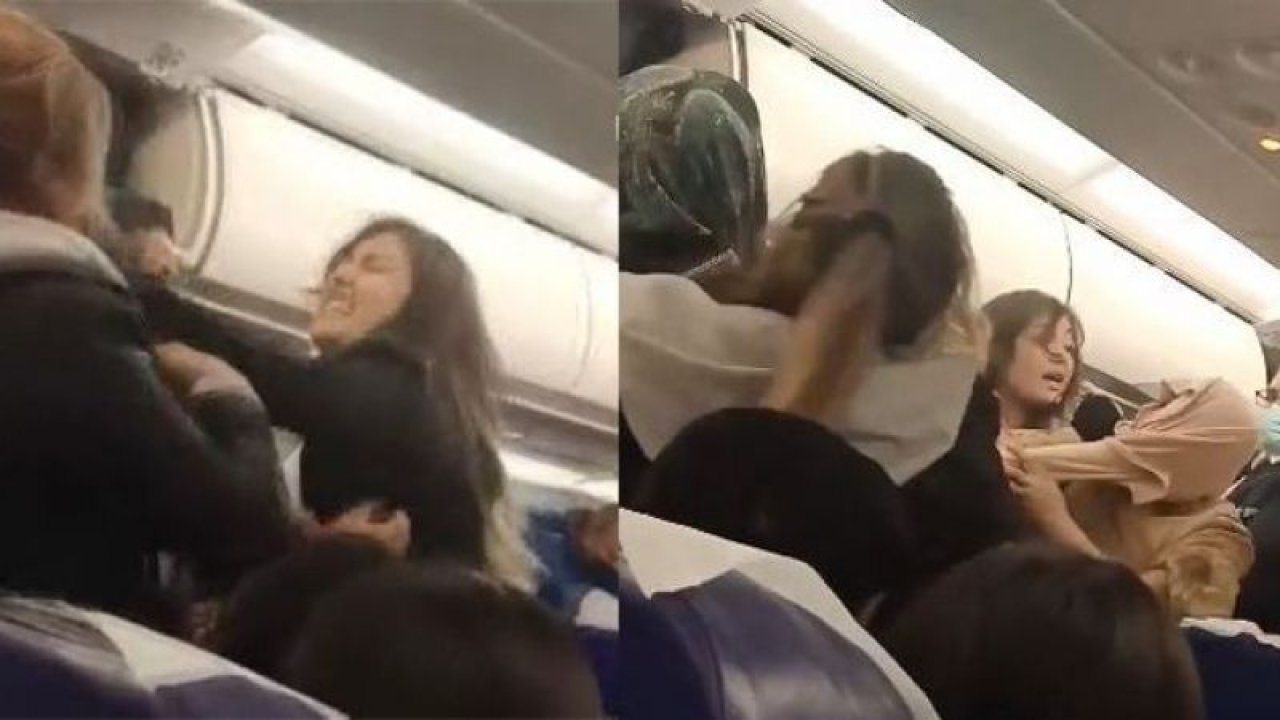 Video İzle...Uçakta Saç Saça...Baş Başa Kavga Ettiler