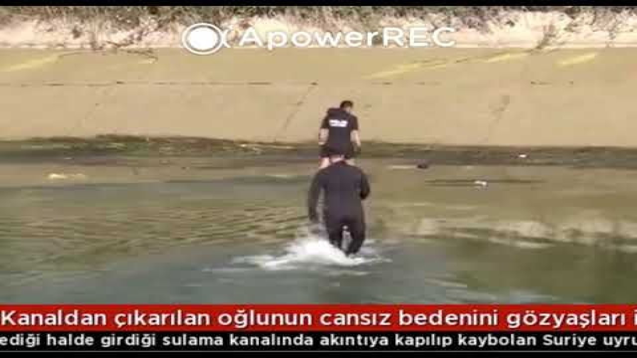 Son Dakika: Video Haber...Kanaldan çıkarılan oğlunun cansız bedenini gözyaşları içinde kucağında taşıdı
