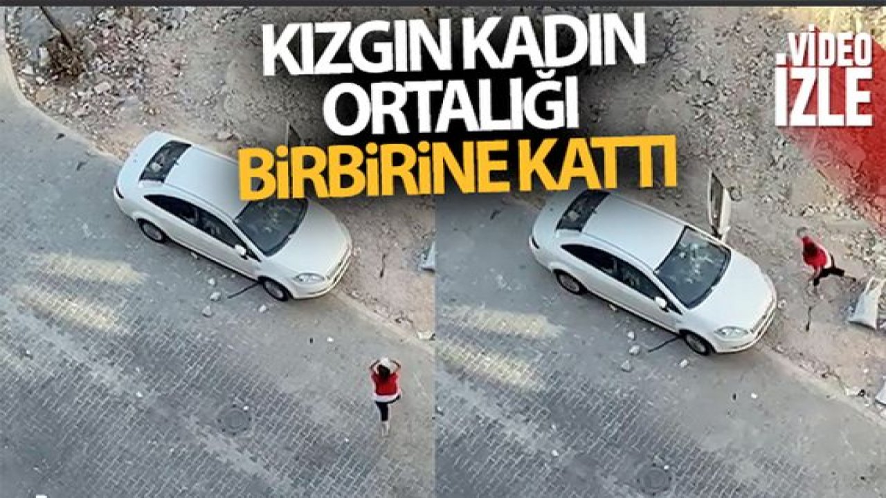 Son Dakika:Video Haber...Kızgın kadın arabayı taşa tuttu