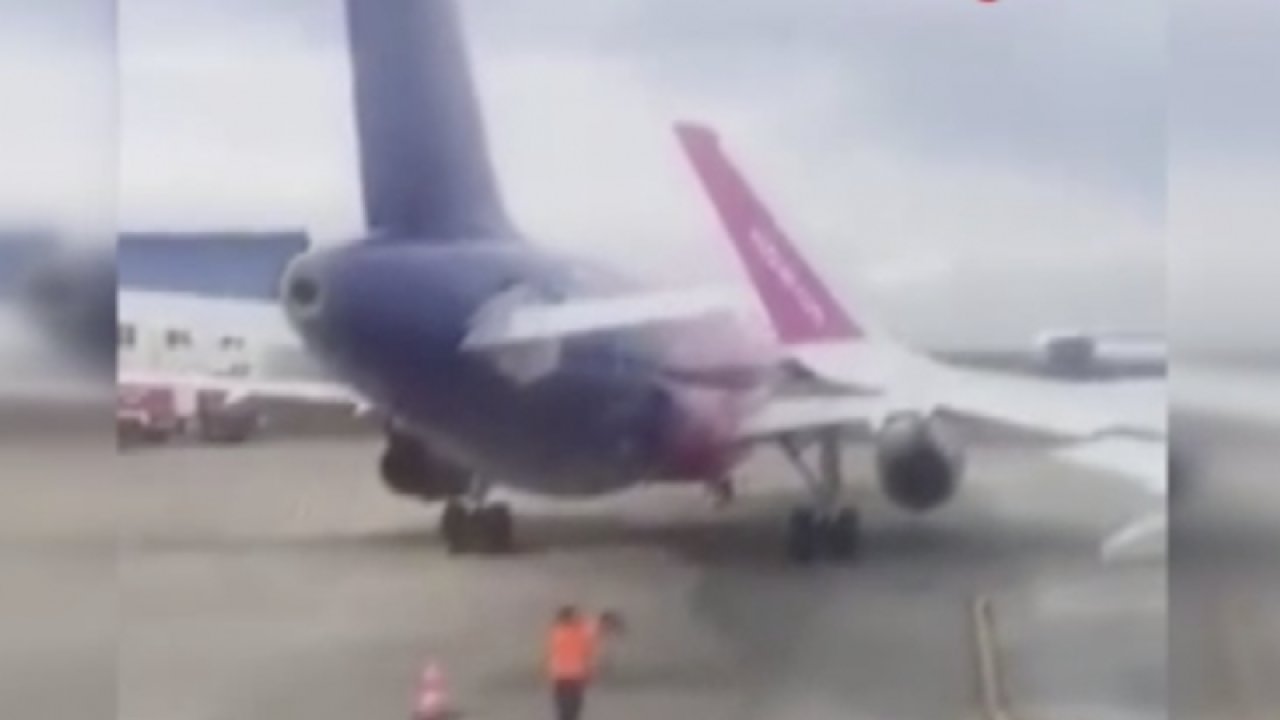 Kalkış yapmaya çalışan uçak park halindeki uçağın kanadına çarptı