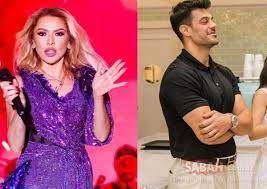 Gaziantepli Damat Mehmet Dinçerler ile boşanma aşamasında olan Hadise sahnede yüzüğünü fırlattı